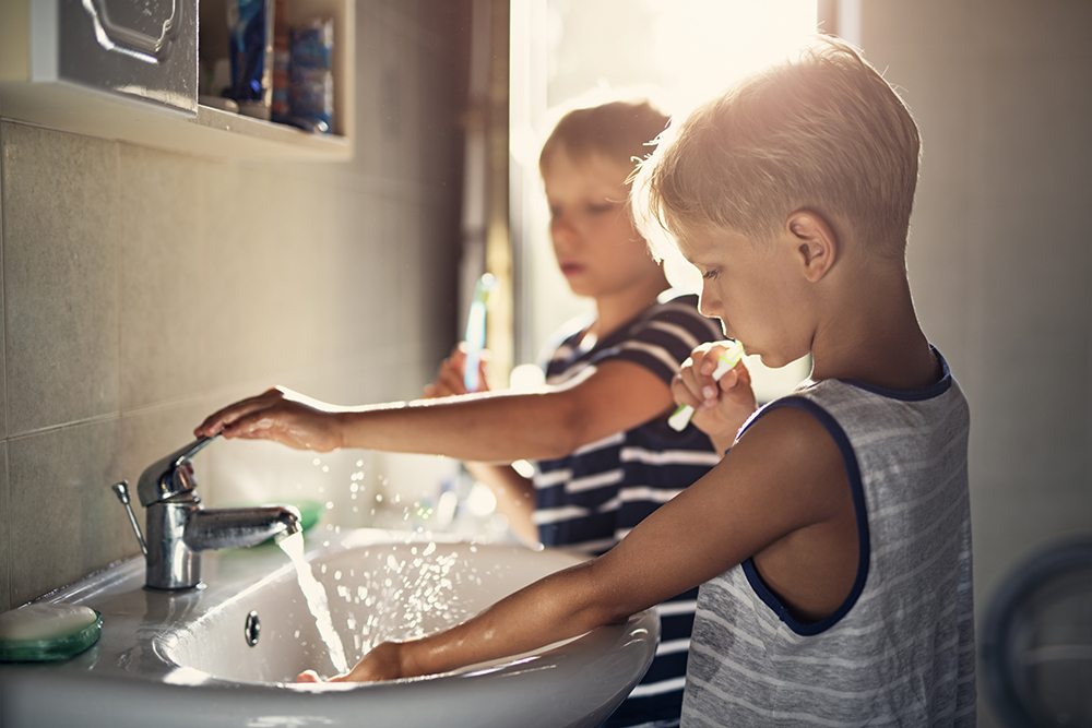 Kids brushing teeth